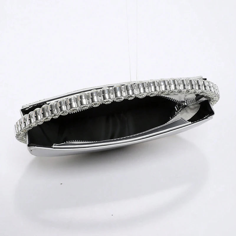 Ladies' fashionable handbag hand-held bag, with a simple and exquisite circular design that sparkles and is delicate for women.