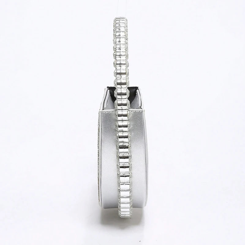Ladies' fashionable handbag hand-held bag, with a simple and exquisite circular design that sparkles and is delicate for women.